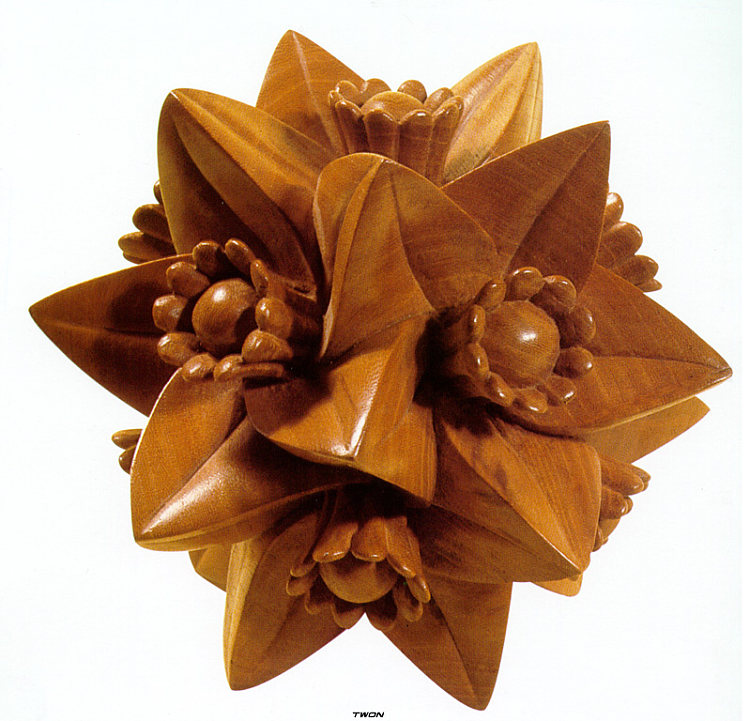 多面体与花 Polyhedron with Flowers (1958)，莫里兹·柯尼利斯·艾雪